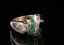 Appraisal: An Emerald And Diamond Ladies' Ring An emerald and diamond