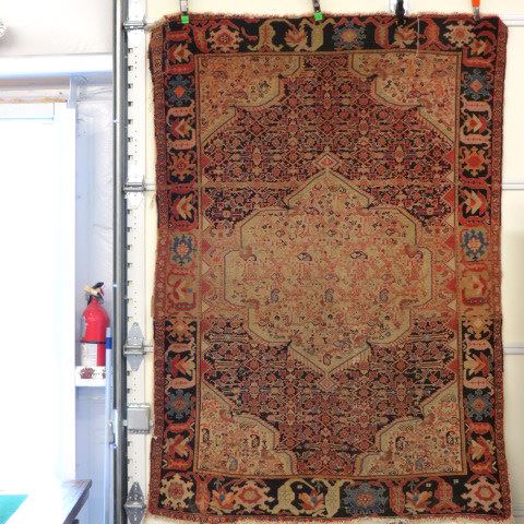 Appraisal: Antique Senna Persian Handmade Rug elaborate tadpole style symbols geometrics