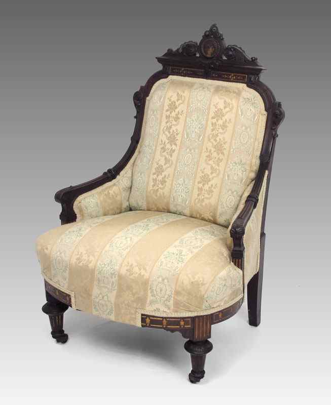 Appraisal: ROSEWOOD CARVED VICTORIAN CHAIR Carved crest with painted portrait cabochon