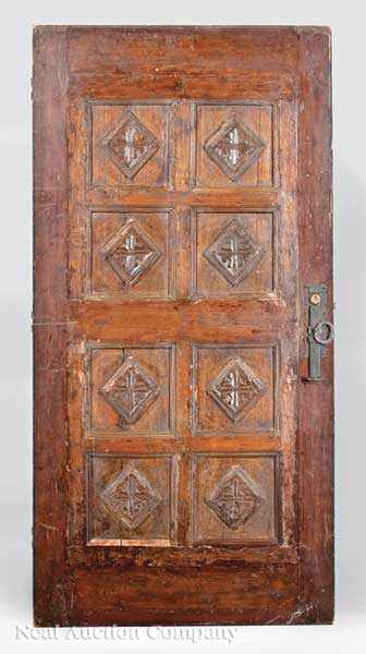 Appraisal: A Carved Wood Eight Panel Door height in width in