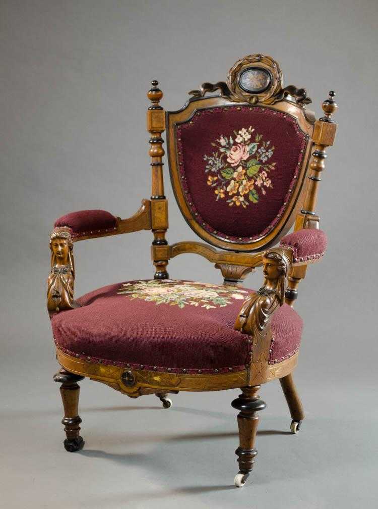 Appraisal: VICTORIAN WALNUT AND FLORAL NEEDLEPOINT ARMCHAIR attributed to John Jeliff