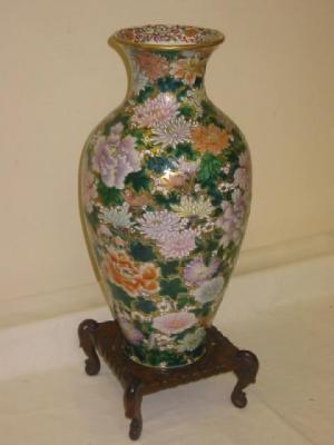 Appraisal: A CHINESE PORCELAIN VASE of ovoid form with flared rim