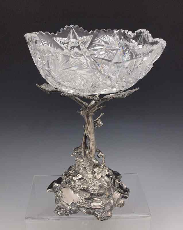 Appraisal: BRILLIANT CUT GLASS BOWL ON TREE FORM STAND Silverplated tree