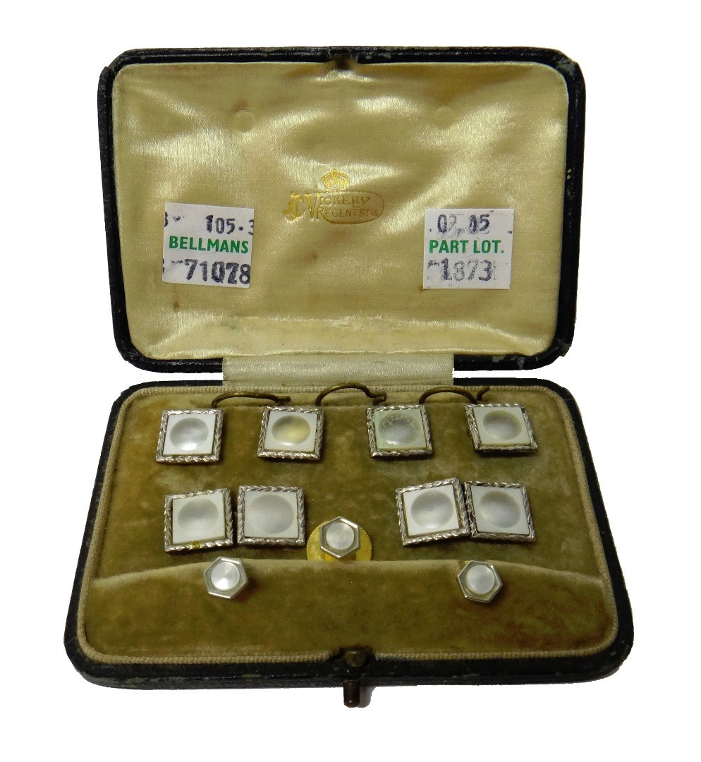 Appraisal: A gold mounted mother of pearl part dress set comprising