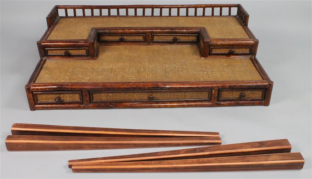 Appraisal: BRITISH COLONIAL STYLE RATTAN AND BAMBOO DESK half galleried superstructure