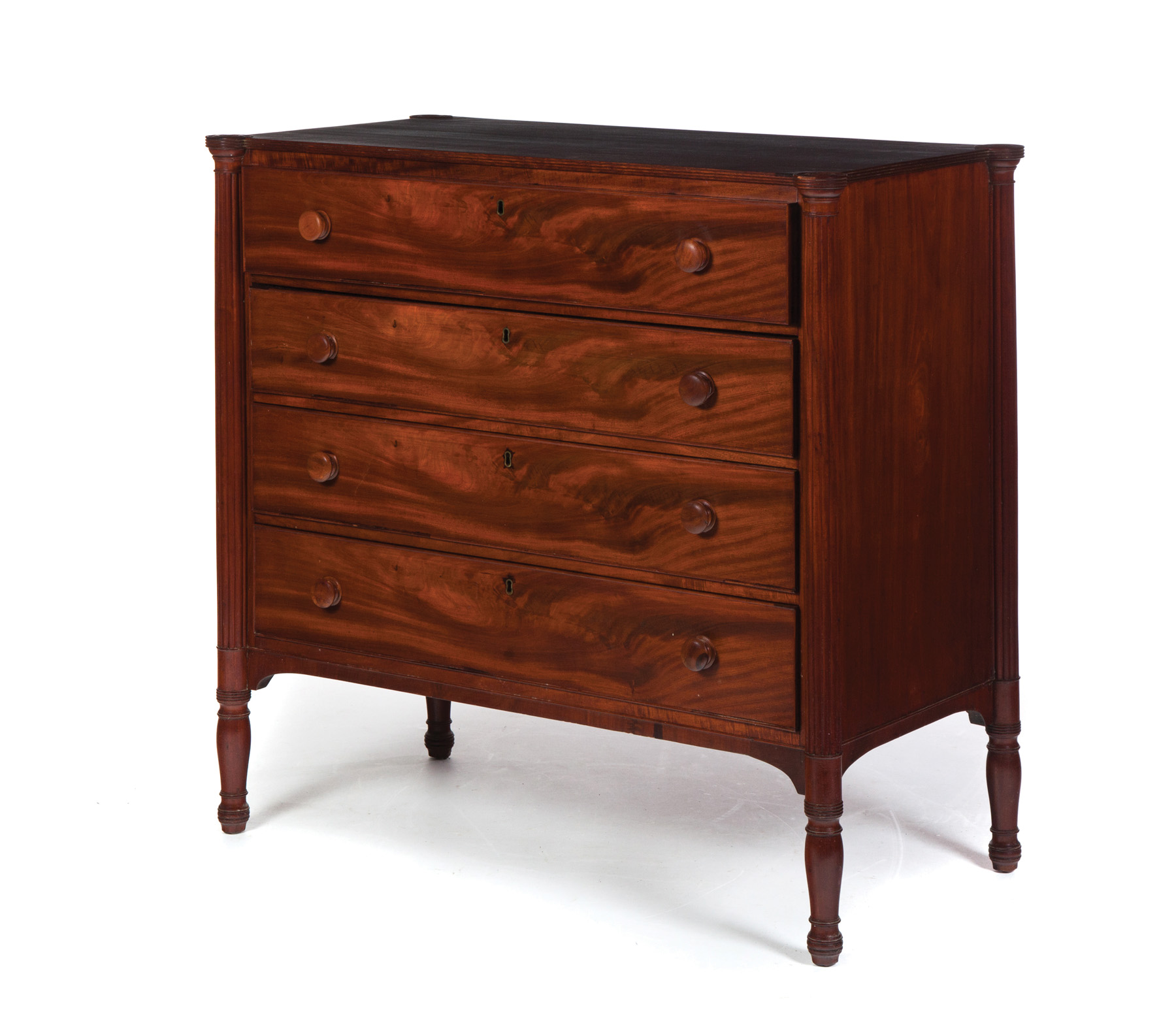 Appraisal: SHERATON FOUR-DRAWER CHEST American st quarter- th century mahogany with