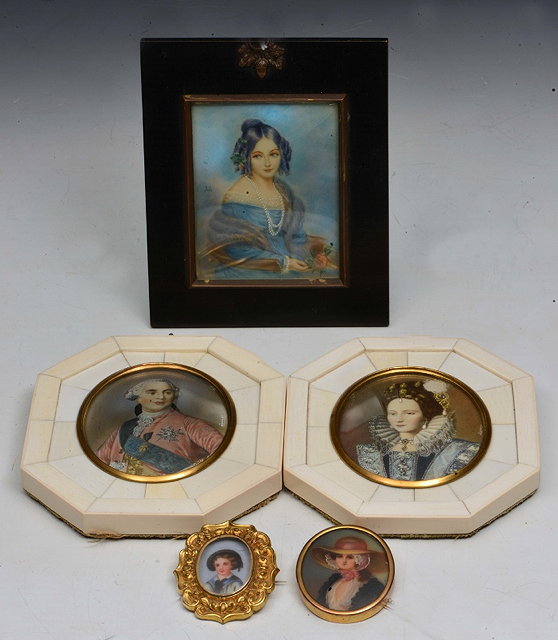 Appraisal: A PAIR OF FRENCH MINIATURES PAINTED PORTRAITS of Louis XVI