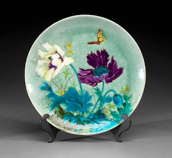 Appraisal: A Milet glazed earthenware and enameled charger with foil inclusions