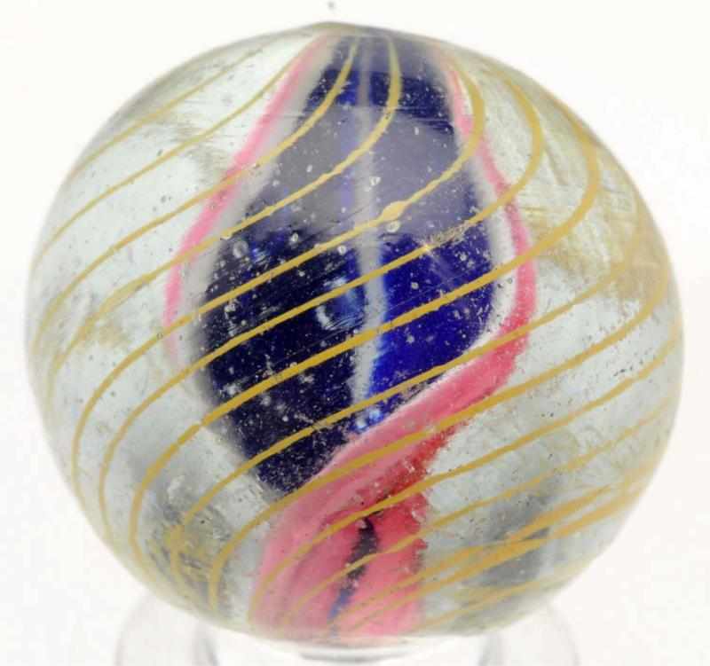 Appraisal: Single Ribbon Swirl Marble One side of ribbon is blue