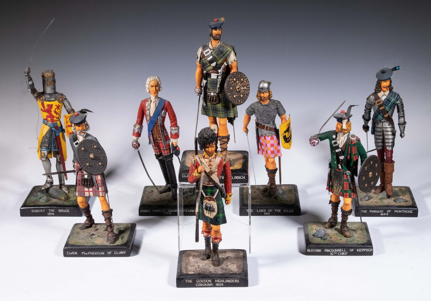 Appraisal: HISTORIC SCOTS FIGURES BY I H ARTHUR Hand Crafted Wood