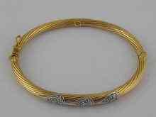 Appraisal: A yellow metal tests carat gold bangle of cable design