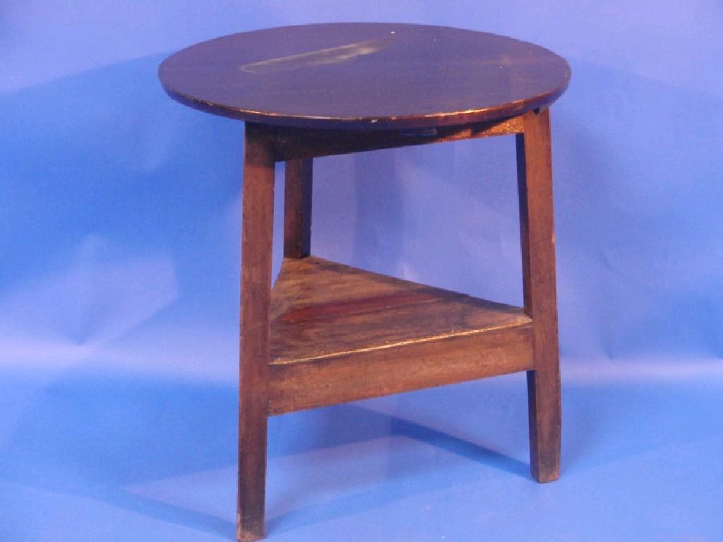 Appraisal: A thC mahogany cricket side table a circular top raised