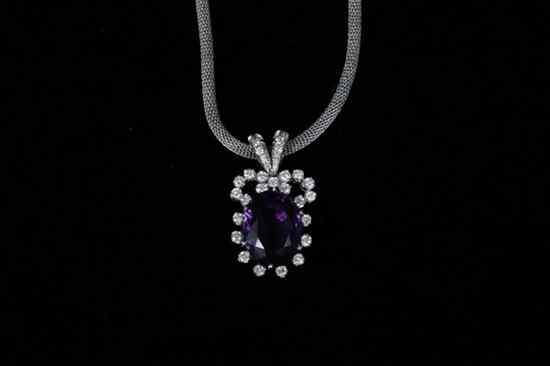 Appraisal: K WHITE GOLD DIAMOND AND AMETHYST PENDANT ON CHAIN Oval