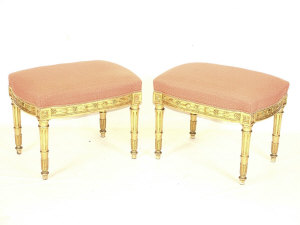 Appraisal: A pair of giltwood stools th century the upholstered seats