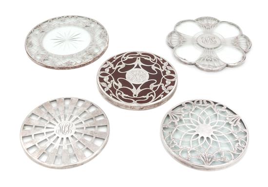 Appraisal: Sale Lot Five Silver Overlay Trivets comprising four circular examples