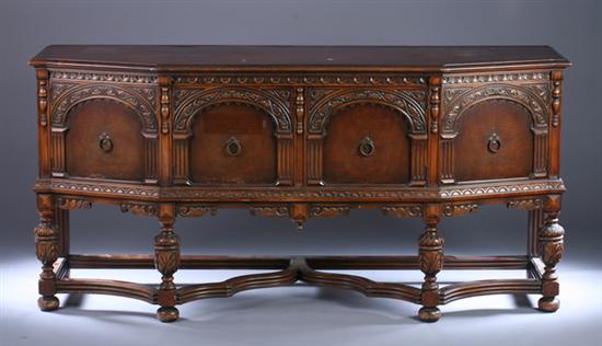 Appraisal: RENAISSANCE REVIVAL MAHOGANY SIDEBOARD th century Pair central arch-carved doors