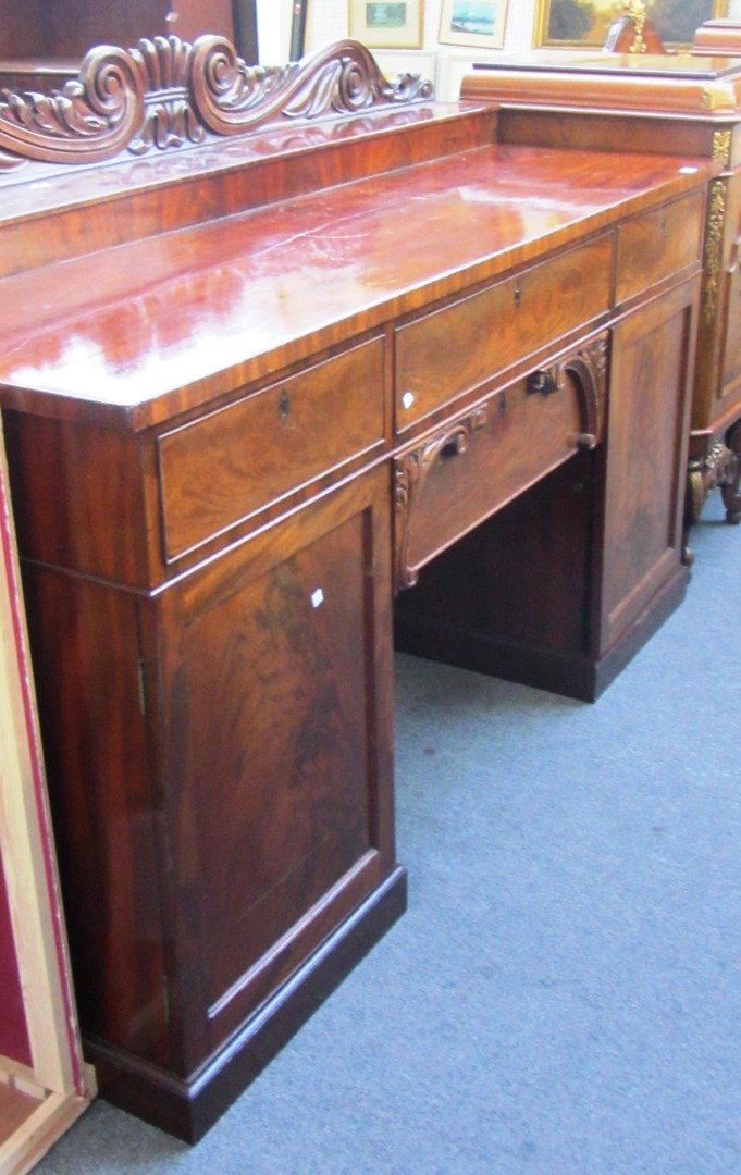 Appraisal: A Victorian mahogany pedestal sideboard on plinth base cm wide