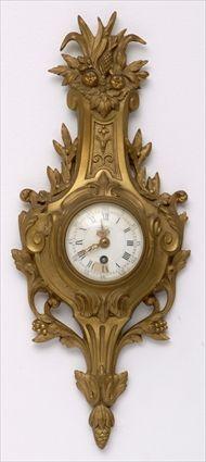 Appraisal: LOUIS XVI-STYLE GILT-METAL SMALL CARTEL CLOCK Retailed by Tiffany Co