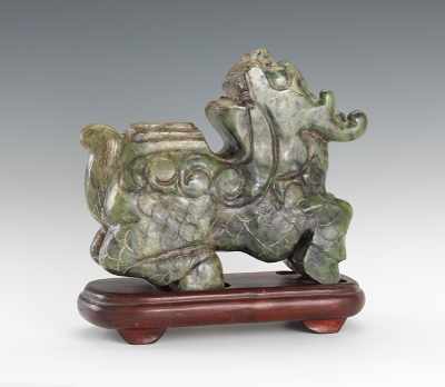 Appraisal: Jade Dragon Figurine Jade dragon figurine with carved wooden stand