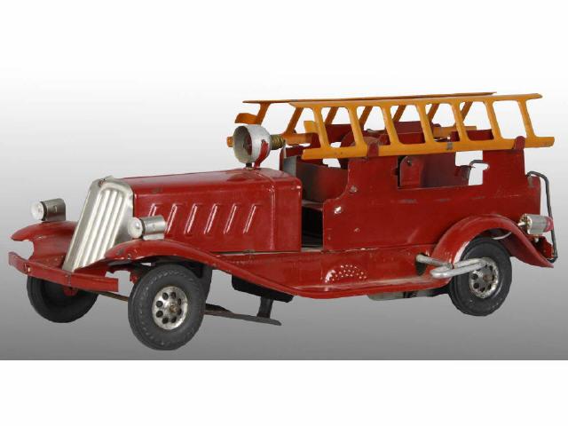 Appraisal: Marx Pressed Steel Fire Ladder Truck Toy Description Working Battery-operated