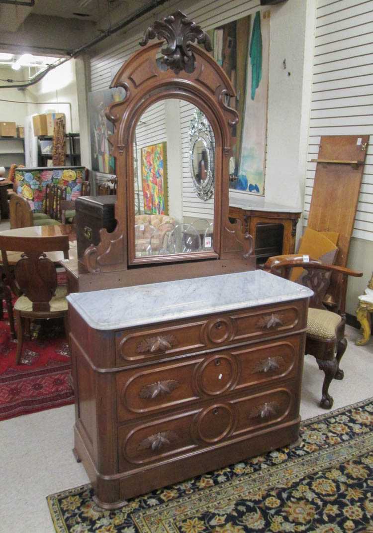 Appraisal: VICTORIAN WALNUT MARBLE-TOP DRESSER WITH MIRROR American c a three-drawer