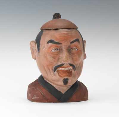 Appraisal: An Asian Character Head Tobacco Jar Terracotta with matte finish