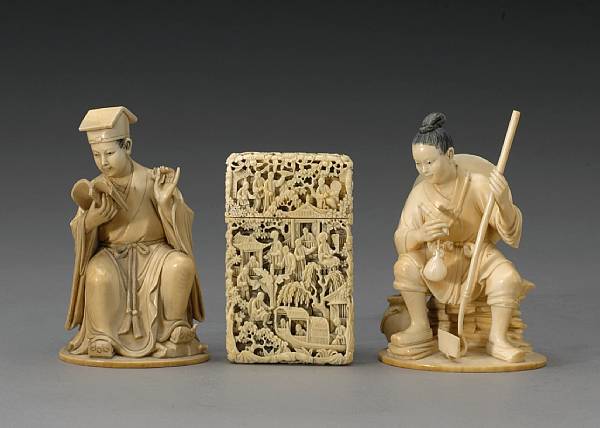 Appraisal: A group of three carved ivory decorations The first a