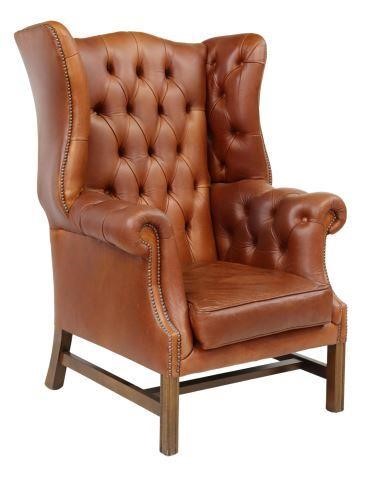 Appraisal: English Chippendale style wingback armchair th c in brown leather