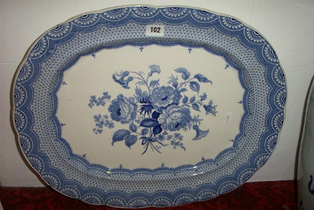 Appraisal: A th century blue and white printed meat plate with