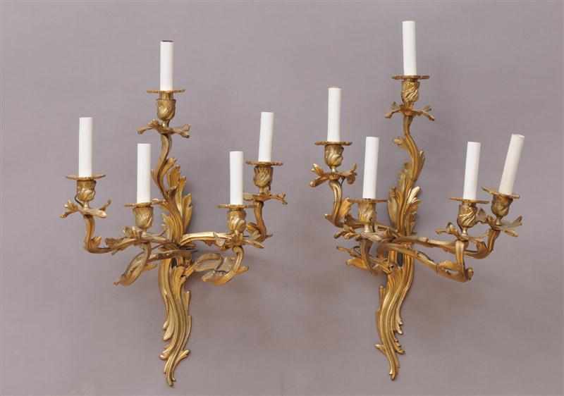 Appraisal: PAIR OF LOUIS XV STYLE GILT-BRONZE FIVE-LIGHT WALL APPLIQUES Each