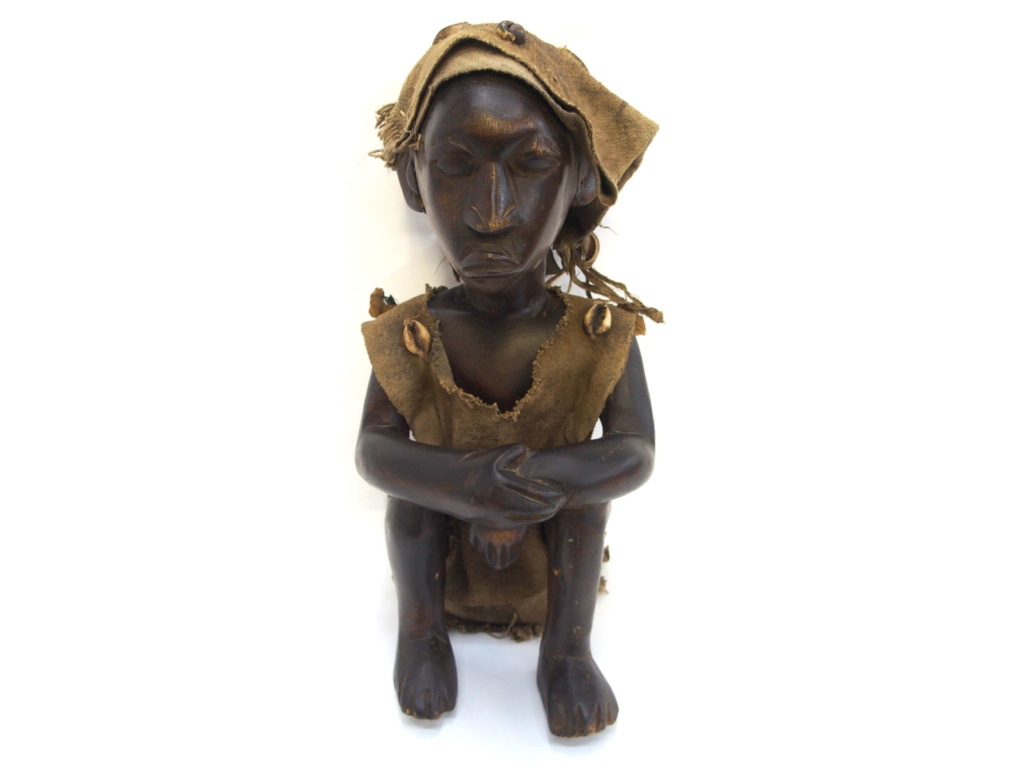 Appraisal: Carved wooden African figure of a man with fabric clothing