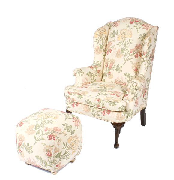 Appraisal: A George III style wing armchair and two footstools height