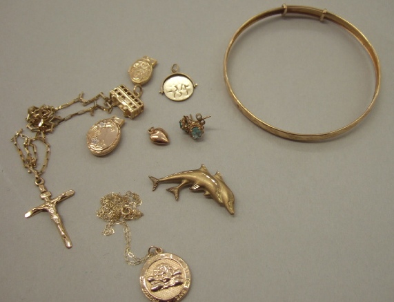 Appraisal: Mostly ct gold jewellery comprising a bangle a charm designed