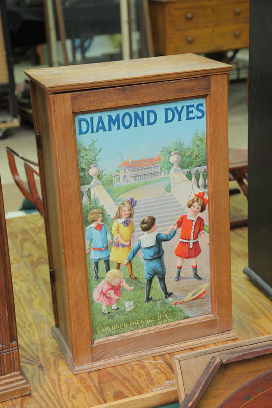 Appraisal: DIAMOND DYES CABINET Double sided oak cabinet with embossed tin