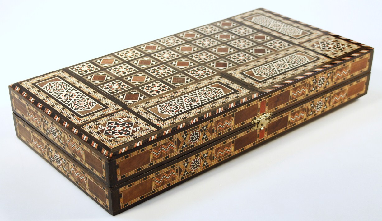 Appraisal: A thC marquetry inlaid games box of rectangular outline hinging