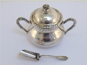 Appraisal: An Italian silver covered sugar bowl standard with ropework handles