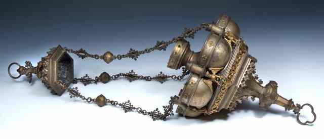 Appraisal: A GOTHIC STYLE HANGING LANTERN with three chains winged mythological