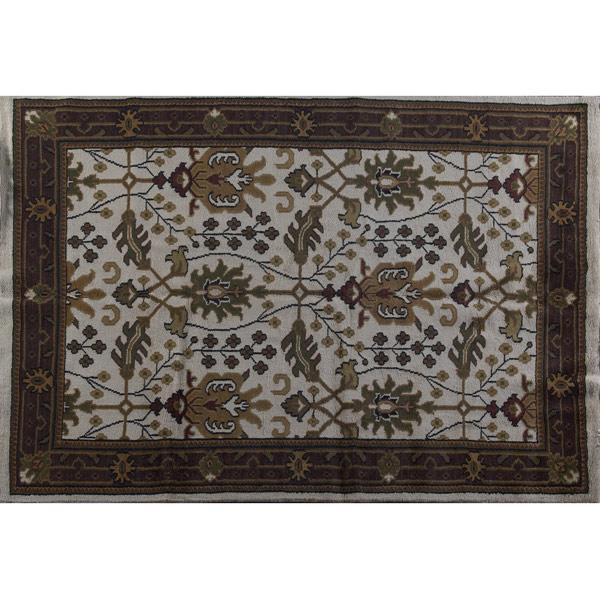 Appraisal: WILLIAM MORRIS STYLE Contemporary area rug with an olive green