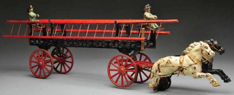 Appraisal: Cast Iron Carpenter Ladder Truck Horse-Drawn Toy Description American Comes