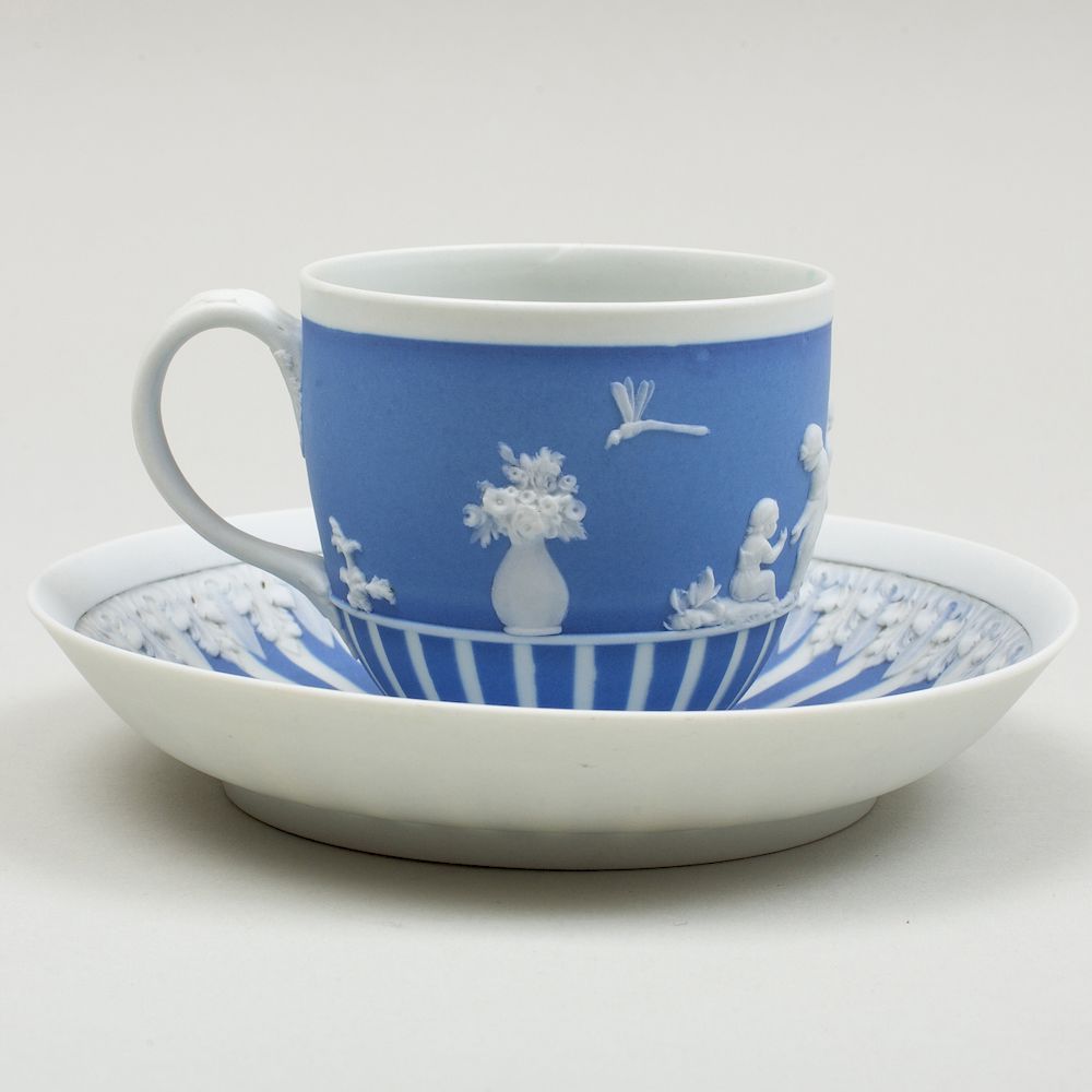 Appraisal: Wedgwood Blue and White Jasperware Cup and Saucer Impressed mark