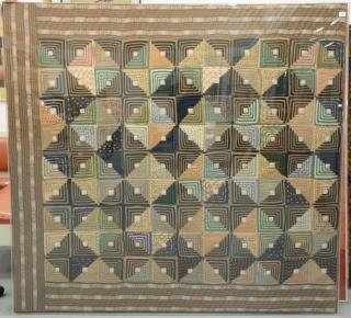 Appraisal: Log cabin style quilt squares with borders stretched and in