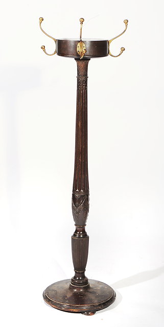 Appraisal: A MAHOGANY COAT RACK of column form with reeded and