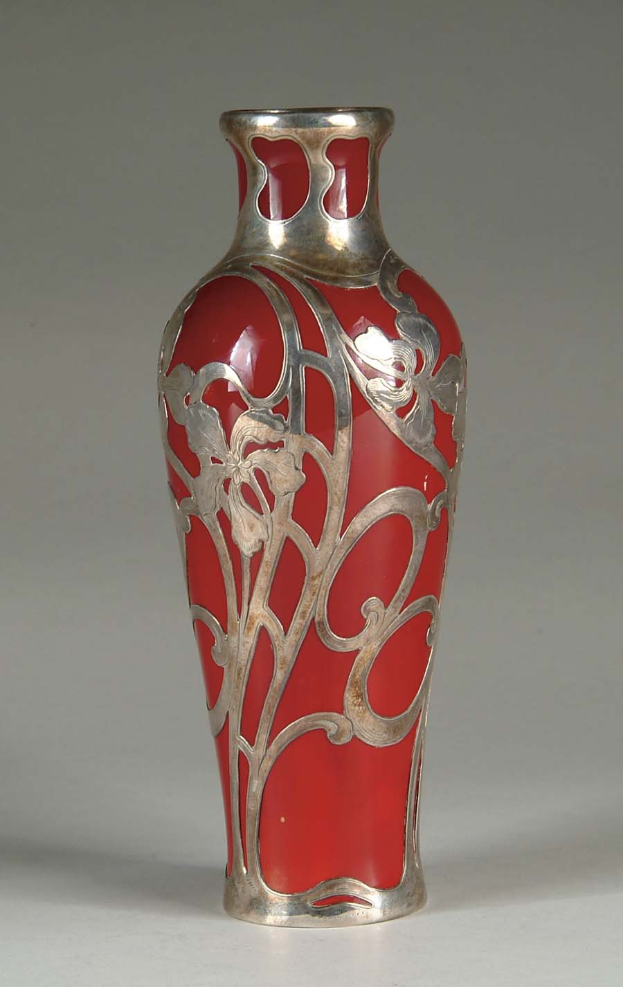 Appraisal: ROYAL DOULTON OVERLAY VASE Flambe vase with silver floral overlay