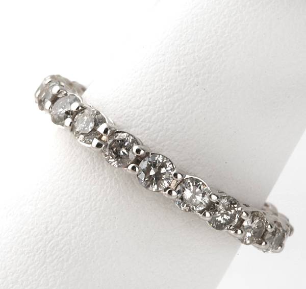 Appraisal: A diamond and k white gold eternity band estimated total