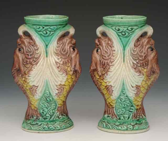 Appraisal: A PAIR OF CHINESE KANGXI MOULDED VASES each in the