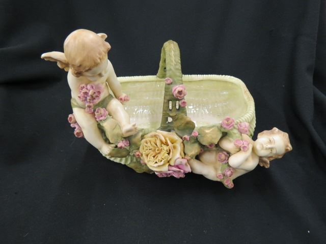 Appraisal: Teplitz Amphora Art Pottery Basket figural cherubs and florals tall