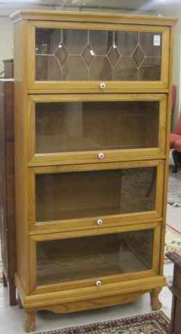 Appraisal: 'STACKING'' OAK BARISTER BOOKCASE American antique reproduction featuring four horizontal