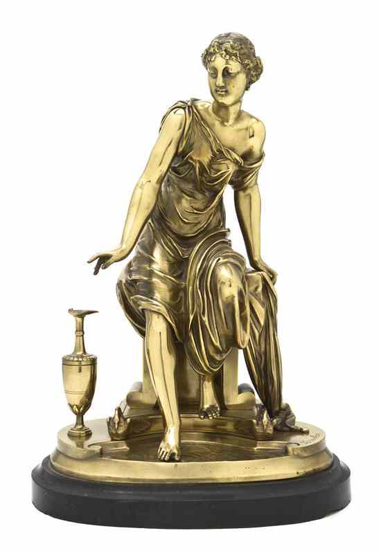 Appraisal: A French Gilt Bronze Figure Bruchon depicting a seated maiden