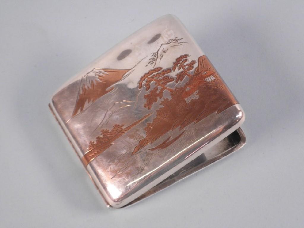 Appraisal: A Japanese white metal cigarette case with copper decoration of