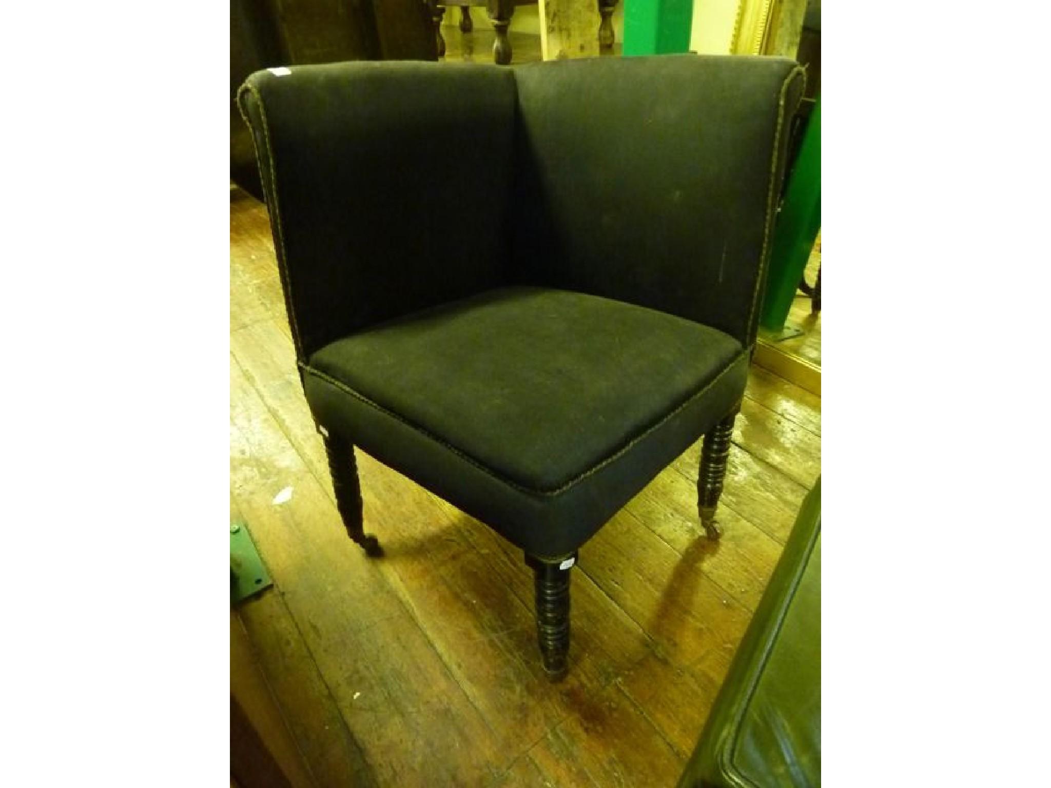 Appraisal: A th century corner chair with upholstered finish raised on